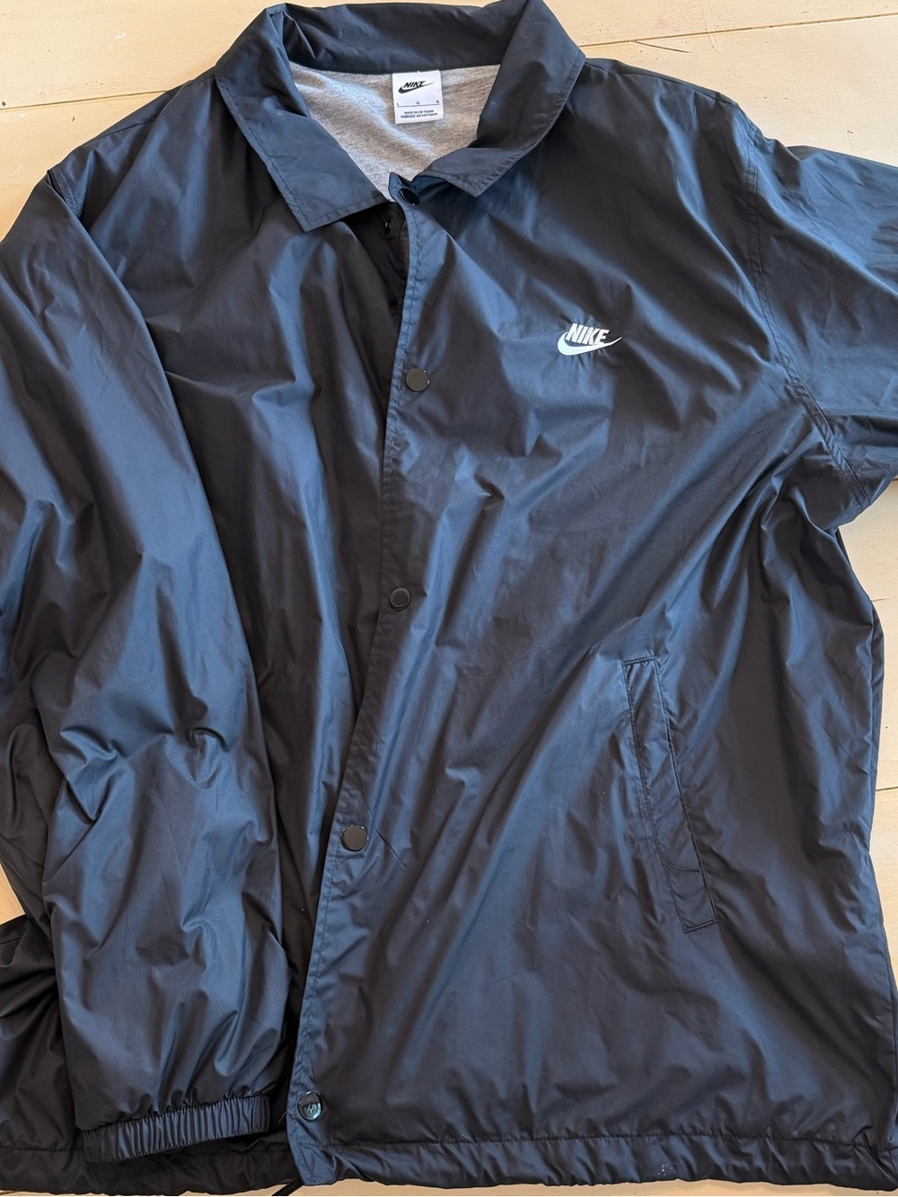 Nike Men's Black Windbreaker Coach Jacket with White Logo